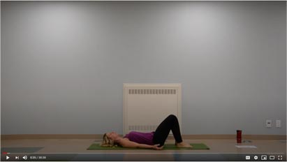 video screenshot of instrucot doing yoga